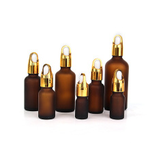 Custom empty 15ml 30ml 50ml 100ml frosted amber cosmetic glass essential oil dropper bottle